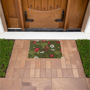 Wrens and strawberries on dark green doormat