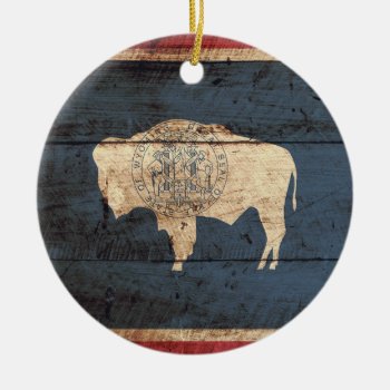 Wyoming State Flag On Old Wood Grain Ceramic Ornament by electrosky at Zazzle
