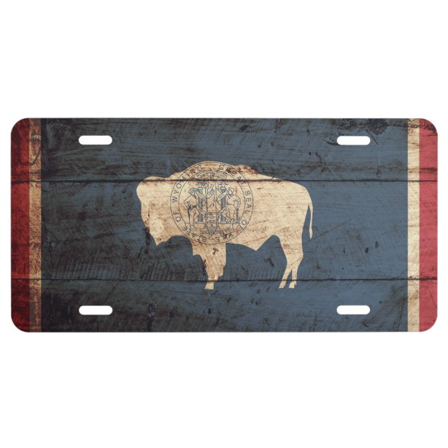 Wyoming State Flag on Old Wood Grain License Plate (Front)