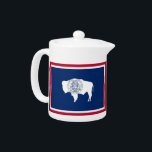 Wyoming State Flag Teapot<br><div class="desc">Add a touch of Wyoming pride to your tea time with our exclusive teapot featuring the flag of Wyoming! Crafted with meticulous attention to detail, this teapot is more than just a functional item; it’s a celebration of Wyoming’s heritage and cultural pride. The elegant design prominently displays the iconic Wyoming...</div>