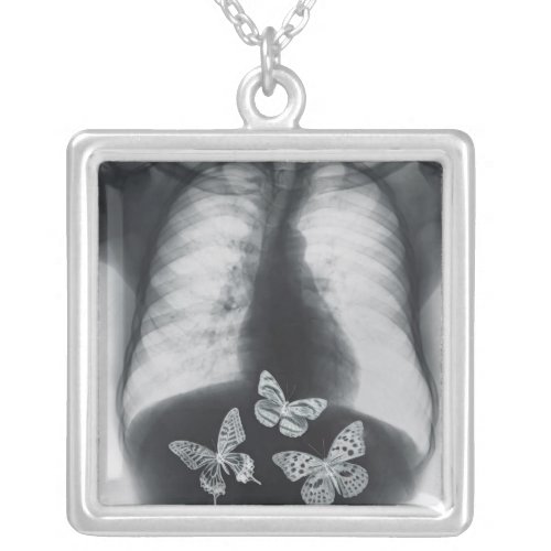 X_ray of butterflies in the stomach silver plated necklace