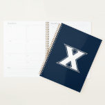 Xavier University Planner<br><div class="desc">Get ready to level up your everyday swagger and show the world your undeniable school pride with this official Xavier University product! Whether you are a dedicated student crushing your classes on the vibrant campus, a proud alumni representing your fierce collegiate roots, or a passionate fan cheering loudly for the...</div>