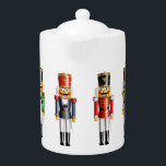 Xmas Nutcracker Teapot<br><div class="desc">This Christmas-themed porcelain tea pot decorated with nutcracker toy soldiers in colorful hussar uniforms will make your tea time even merrier this holiday season! It also makes a great Christmas present for family and friends.</div>