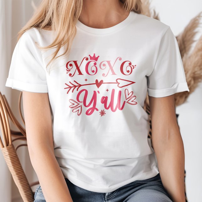 XOXO Y'all Pink Arrow and Hearts Valentine's Day T-Shirt (A young blond woman wearing a XOXO Y'all Pink Arrow and Hearts Valentine's Day T-Shirt.)