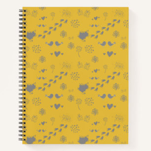 yellow and gray pattern of birds, dots, footsteps, notebook