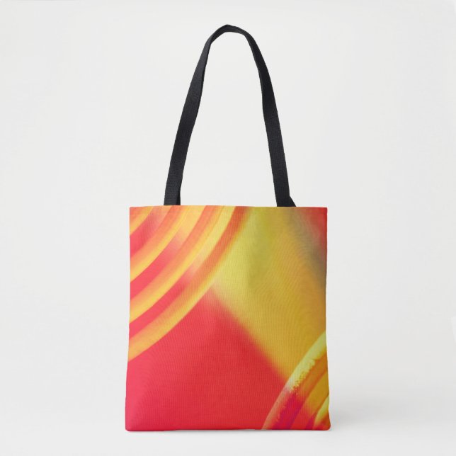 Yellow and orange circular pattern on a tote bag (Front)