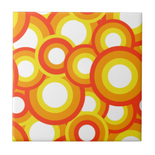 Yellow and orange psychedelic circles ceramic tile