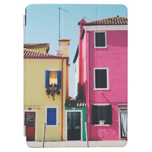 YELLOW AND PINK CONCRETE HOUSES DURING DAYTIME iPad AIR COVER