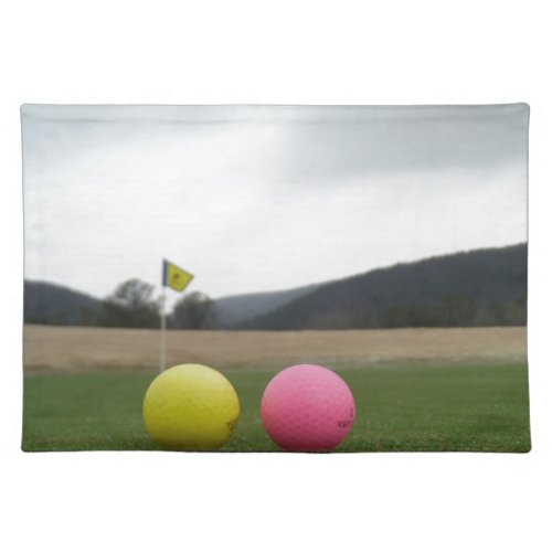 yellow and pink golf balls placemat