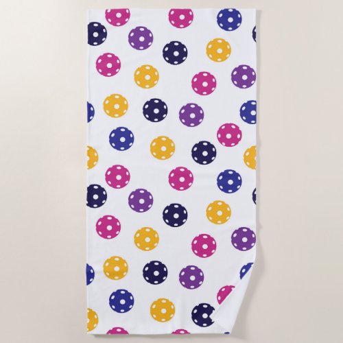 Yellow and purple pickleballs on white Beach Towel