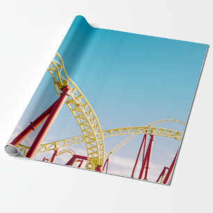 Yellow and red roller coaster under blue sky at da wrapping paper