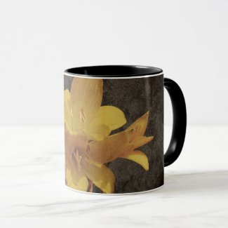 Yellow Asiatic lily on old grunged canvas