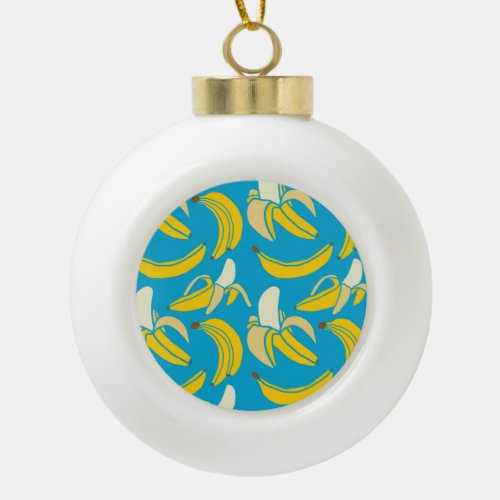 Yellow bananas blue background pattern ceramic ball christmas ornament