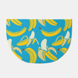 Yellow bananas, blue background pattern doormat