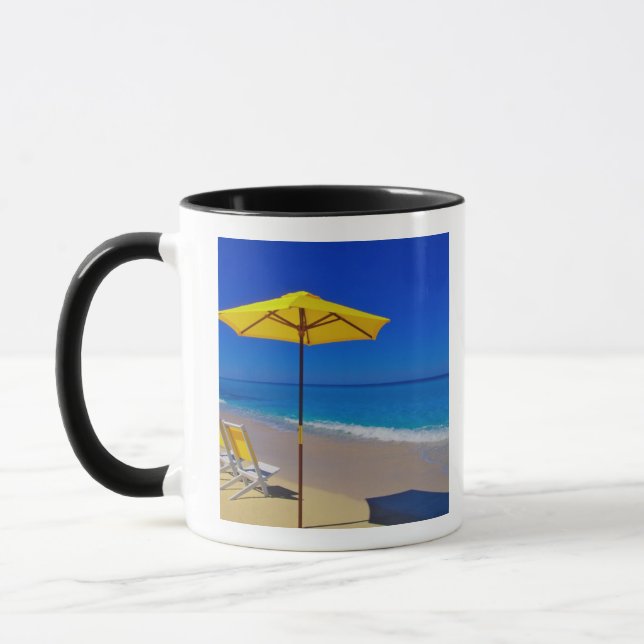 Yellow beach umbrella and chairs on pristine mug (Left)