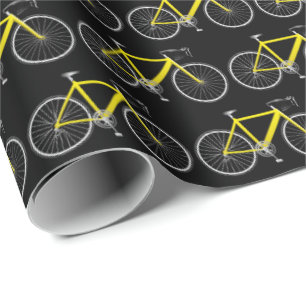yellow bicycle on black wrapping paper