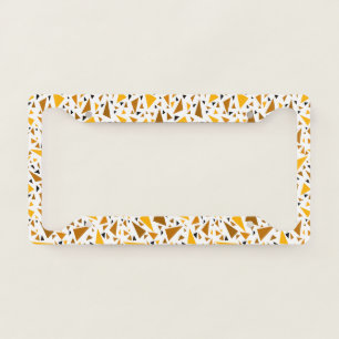 Yellow brown triangles on white retro background license plate frame