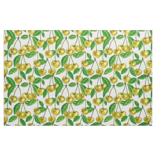 Yellow cherries on white fabric