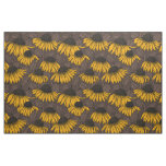 Yellow coneflowers on dark brown fabric