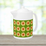 Yellow Dahlia Floral Pattern on Green Teapot<br><div class="desc">White ceramic teapot with lid that features the photo image of a yellow Dahlia flower on a lime green background and printed in a repeating pattern. A fun,  floral design!</div>