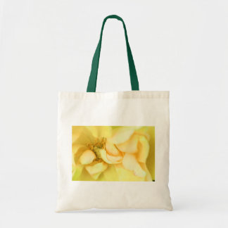 Yellow dancing rose petals tote bag