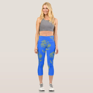Yellow Flower Outline In A Blue Background Capri Leggings