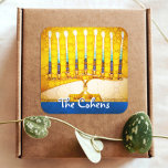 Yellow Gold Hanukkah Menorah Elegant Custom Name Square Sticker<br><div class="desc">A close-up photo of a bright, colorful, yellow gold artsy menorah photo helps you usher in the holiday of Hanukkah. Feel the warmth and joy of the holiday season whenever you use this stunning, colorful Hanukkah sticker. Matching cards, stamps, tote bags, serving trays, and other products are available in my...</div>
