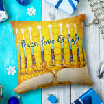 Yellow Gold Hanukkah Menorah Peace Love and Light  Throw Pillow<br><div class="desc">“Peace, love & light.” A close-up photo of a bright, colorful, yellow and gold artsy menorah helps you usher in the holiday of Hanukkah in style. Feel the warmth and joy of the holiday season whenever you relax on this stunning, colorful Hanukkah throw pillow. Makes a striking set of four...</div>