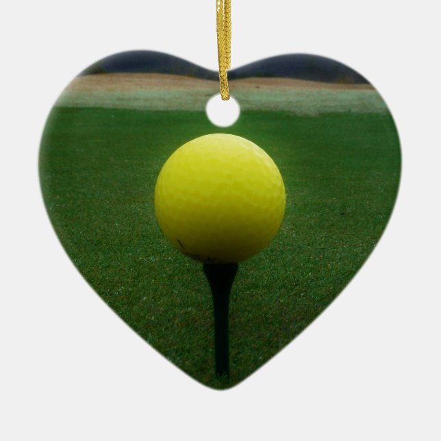 Yellow Golf Ball on a mountain golf course Ceramic Ornament (Front)