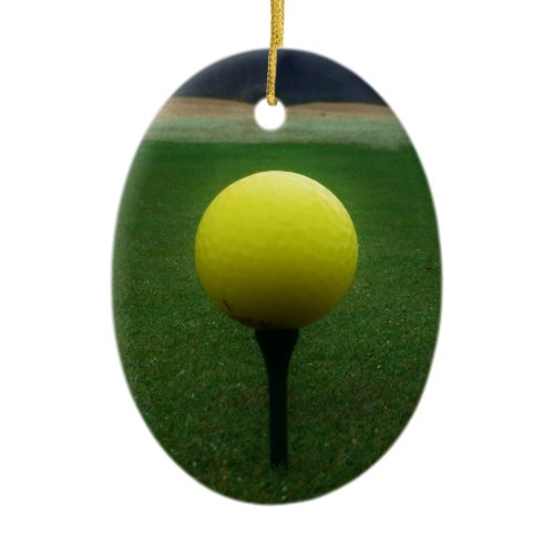 Yellow Golf Ball on a mountain golf course Ceramic Ornament