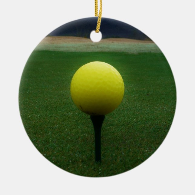 Yellow Golf Ball on a mountain golf course Ceramic Ornament (Front)