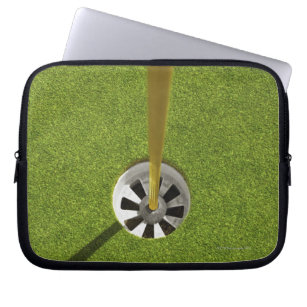 Yellow golf flag pole and hole laptop sleeve