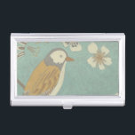 Yellow, Grey and Beige Bird Perched on a Branch Business Card Case<br><div class="desc">Chariklia Zarris is known for her abstract art pieces. In this drawing of a profile of a bird on a blue teal background,  she captured the simplicity of the bird. The white flowers add a romantic touch. Customize your favorite Zazzle product using this beautiful image.</div>