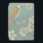 Yellow, Grey and Beige Bird Perched on a Branch iPad Mini Cover<br><div class="desc">Chariklia Zarris is known for her abstract art pieces. In this drawing of a profile of a bird on a blue teal background,  she captured the simplicity of the bird. The white flowers add a romantic touch. Customize your favorite Zazzle product using this beautiful image.</div>