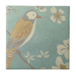Yellow, Grey and Beige Bird Perched on a Branch Tile<br><div class="desc">Chariklia Zarris is known for her abstract art pieces. In this drawing of a profile of a bird on a blue teal background,  she captured the simplicity of the bird. The white flowers add a romantic touch. Customize your favorite Zazzle product using this beautiful image.</div>