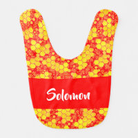 Yellow honeycombs on red baby bib