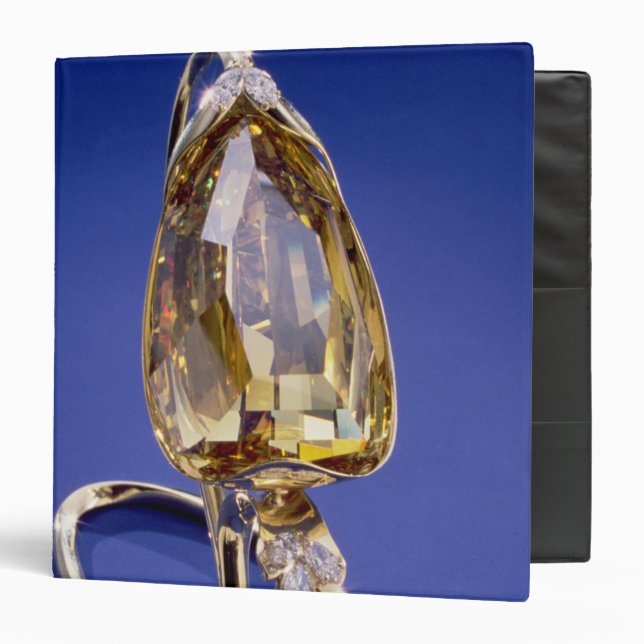 Yellow 'Incomparable' diamond in a gold setting Binder (Front/Inside)