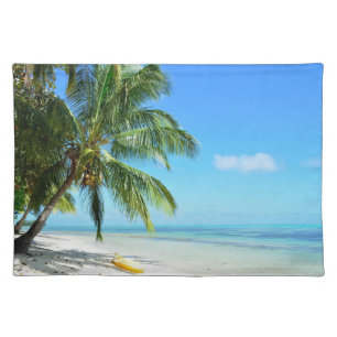 Yellow kayak on a white sand beach placemat