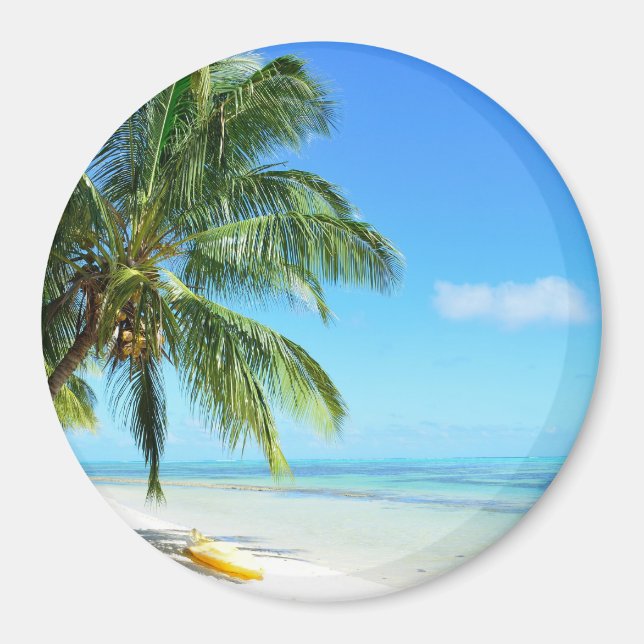 Yellow kayak on a white sand beach round magnet (Front)
