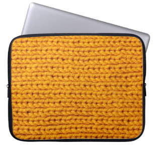 Yellow knitted wool texture background pattern wit laptop sleeve