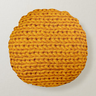 Yellow knitted wool texture background pattern wit round pillow