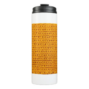 Yellow knitted wool texture background pattern wit thermal tumbler