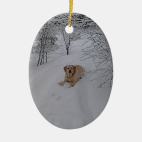 Yellow Lab Relaxing in Fresh Winter Snow Ceramic Ornament
