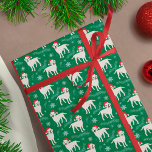 Yellow Labrador Retrievers in Christmas Hats Wrapping Paper<br><div class="desc">Cute labrador retrievers in santa hats with snow and snowflakes in the background. The background color is customizable.</div>
