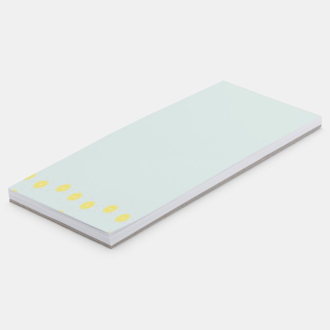 Yellow lemon slices on  blue magnetic notepad (Angled)