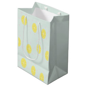 Yellow lemon slices on blue medium gift bag