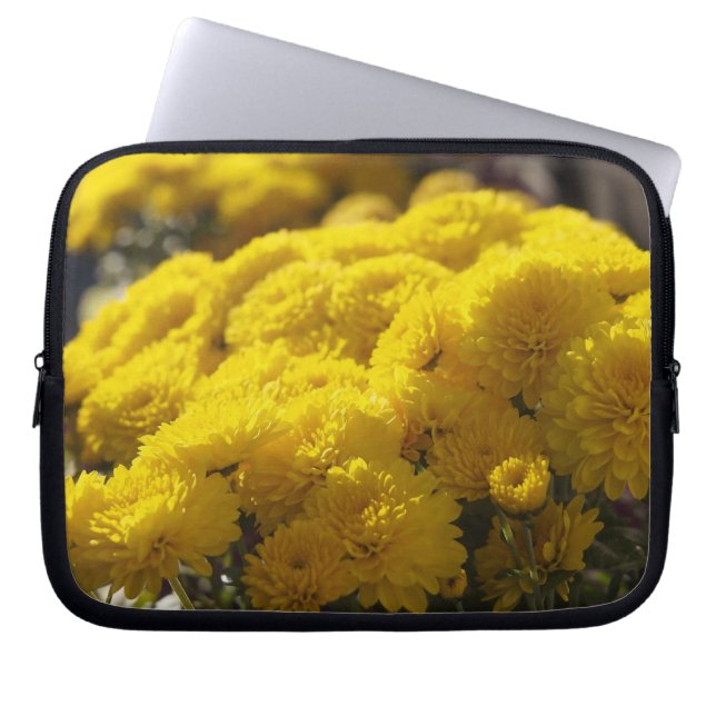 Yellow marigolds bask in sunlight laptop sleeve (Front)