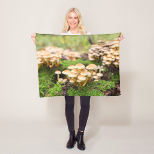 Yellow mushrooms in the autumn forest. fleece blanket