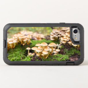 Yellow mushrooms in the autumn forest. OtterBox defender iPhone SE/8/7 case
