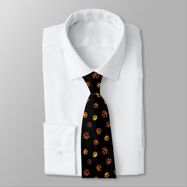 Yellow Orange Brown Paw Prints on Black Neck Tie (Tied)